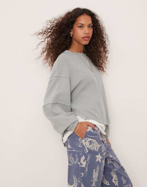 Free People – Jasnoniebieska bluza o luźnym kroju z obniżoną linią ramion