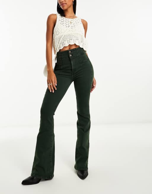 Free People – Jayde – Eng geschnittene Jeans-Schlaghose in Grün