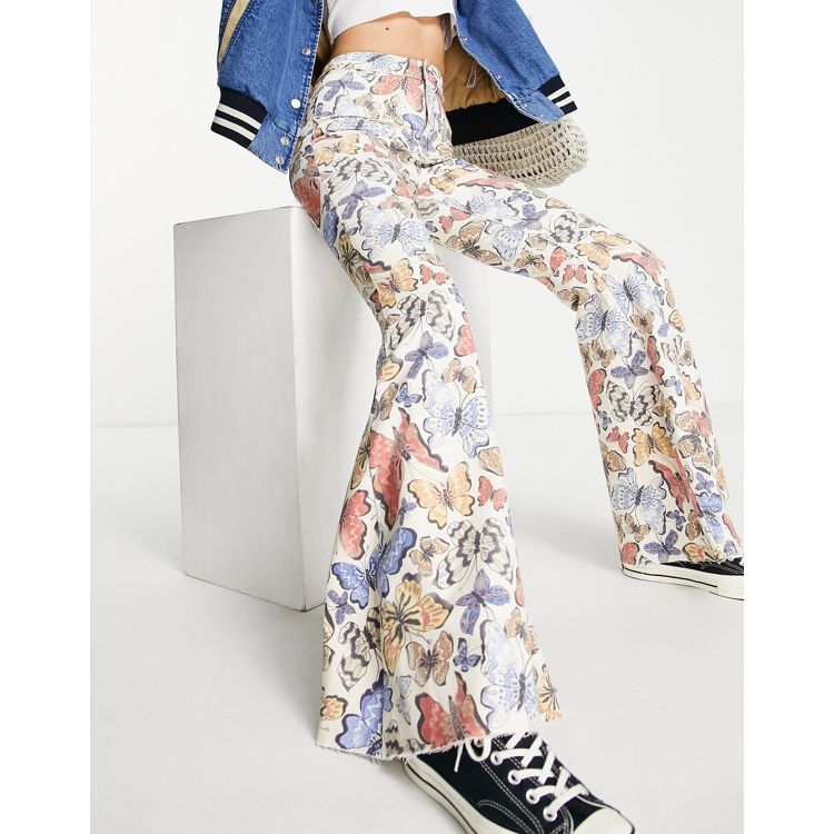 Free People just float on denim flare in butterfly print