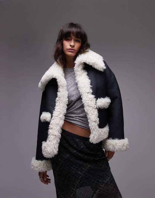Free People - Kiki - Giacca oversize nera e crema con dettagli in pile borg