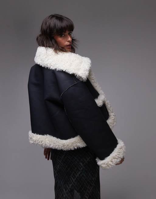 Free People kiki sherpa oversized jacket in black and cream | ASOS