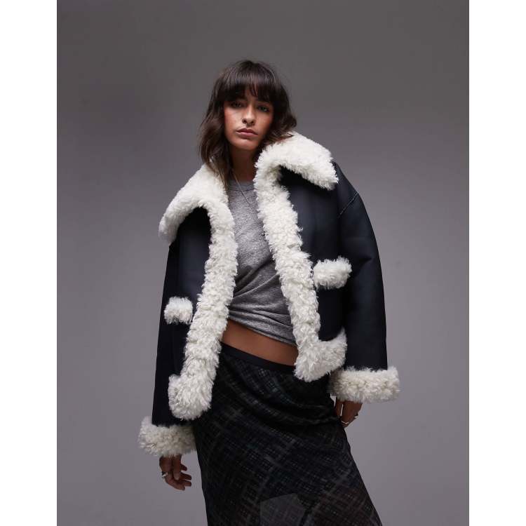Free People kiki sherpa oversized jacket in black and cream | ASOS