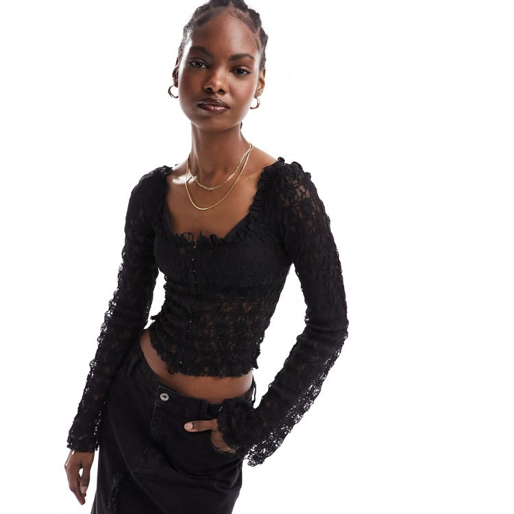 Free People lace hook and eye long sleeve top in Black