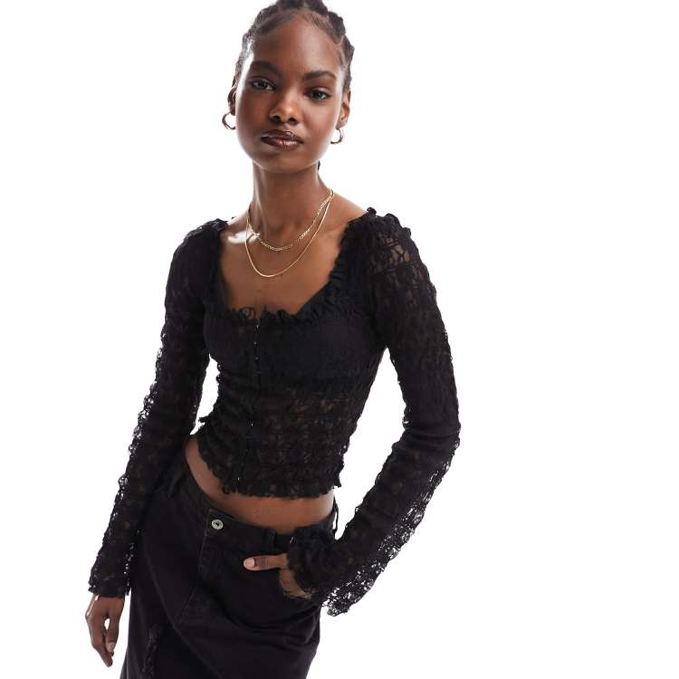 Free People lace hook and eye long sleeve top in black | ASOS