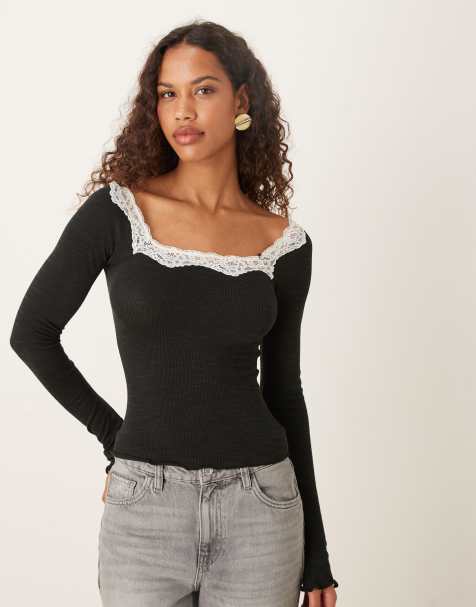 Free People lace trim long sleeve top in black