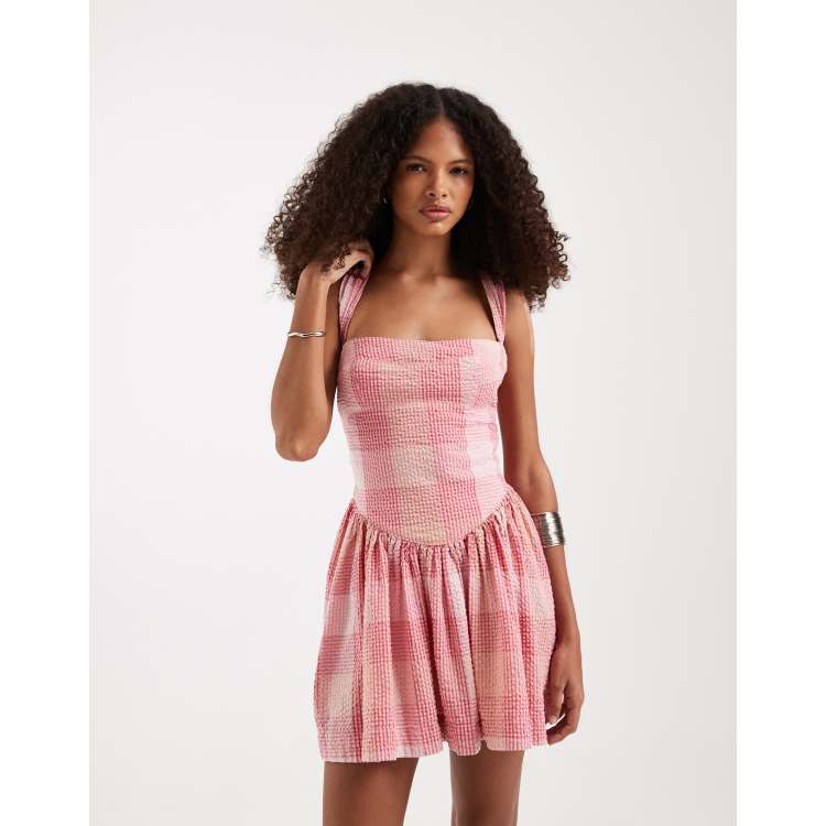 Free People Laurel plaid drop waist mini dress in pink check combo | ASOS