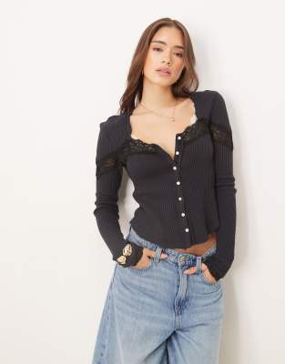 Free People - Lets Party - Strickjacke in Schwarz mit Spitzeneinsatz
