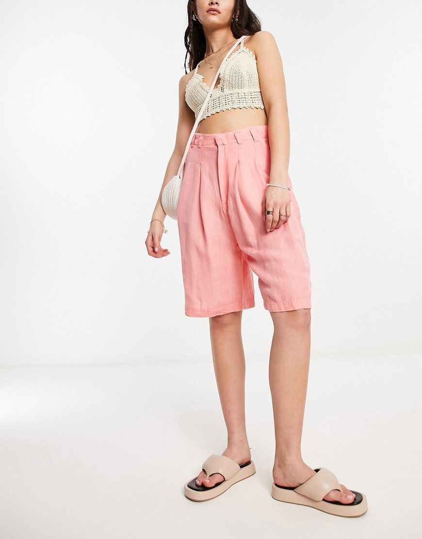 Free People linen high rise longline shorts in coral-Pink