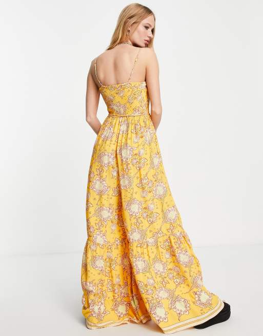 https://images.asos-media.com/products/free-people-little-of-your-love-paisley-print-jumpsuit-in-marigold-yellow/201995151-4?$n_640w$&wid=513&fit=constrain