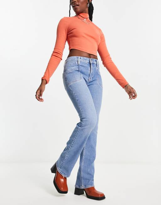 Free People low rise slim boot cut jean in light blue