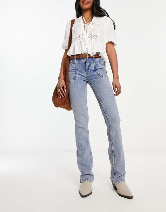 Free People low rise slim boot cut jean in light blue