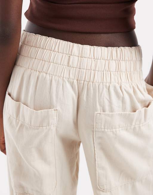 Free People luftiga utsvängda pull-on-byxor med låg midja i ivory, 3 av 5