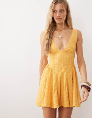 Free People - Minikleid in Gelb mit V-Ausschnitt und Korsett-Design