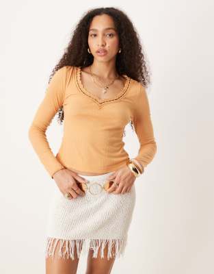 Free People Only You long sleeve top in gold - view 1