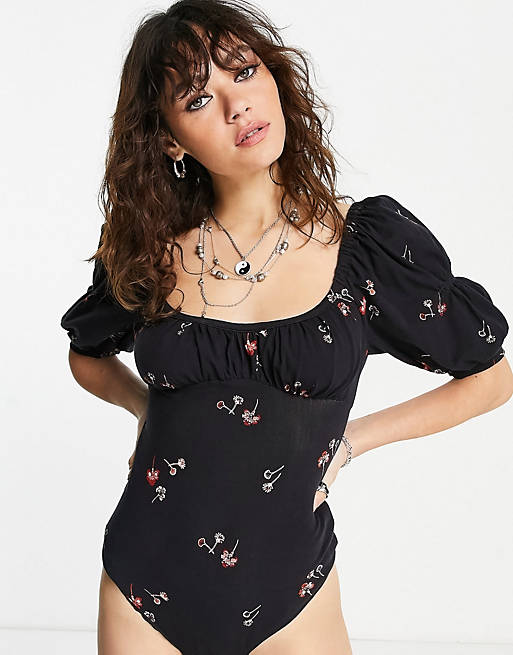 Women Free People play date bodysuit with puff sleeves in vintage floral 