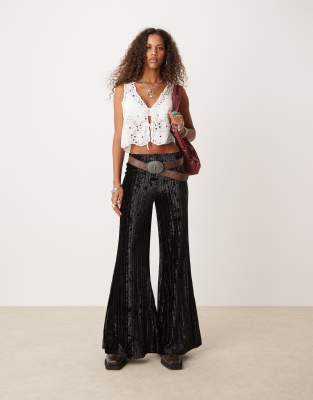 Free People - Plissierte Hose aus Crinkle-Samt in Schwarz mit weitem Bein