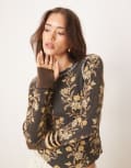 [Free People] Free People Pretty Little floral thermal long sleeve top in black S BLACK COMBO FOLK VIN