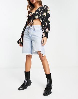 Free People raw edge denim longline shorts in washed blue - ASOS Price Checker