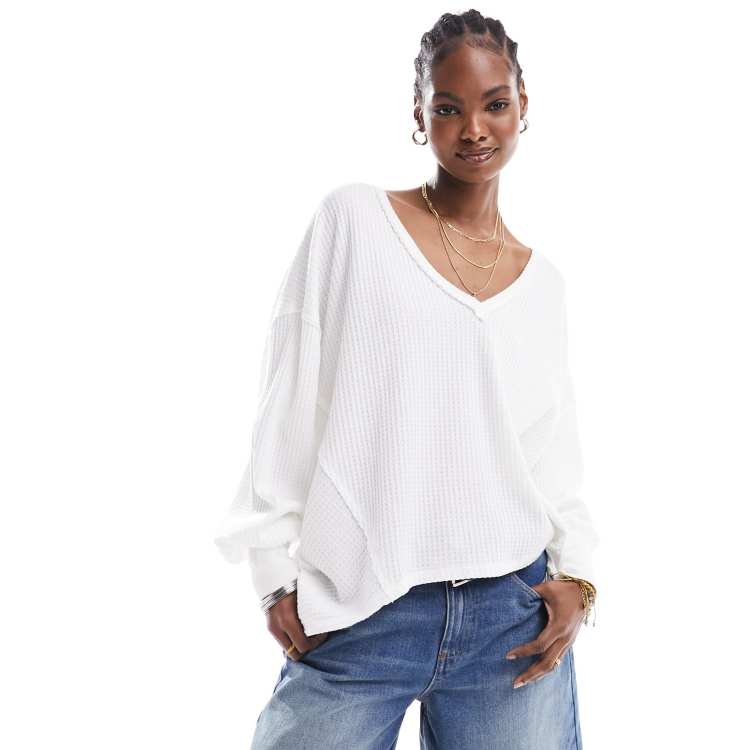 Free People ribbed v neck slouchy oversized sweatshirt in ivory ASOS