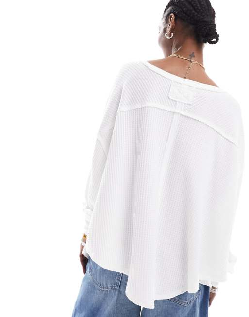 Free People ribbed v neck slouchy oversized sweatshirt in ivory ASOS