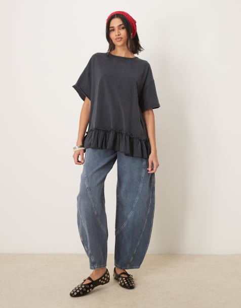 Free People ruffle edge oversized t-shirt tunic in washed black - view 1