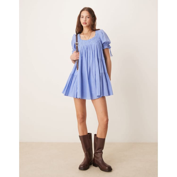 one sleeve cut out mini dress in purple Olivaceous Lenah Lavender Eyelet Cutout Mini Dress | Babydoll V-Neck Puff Sleeve Style