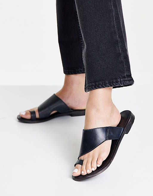 Free People Sant Antoni sandals with toe strap in black | ASOS