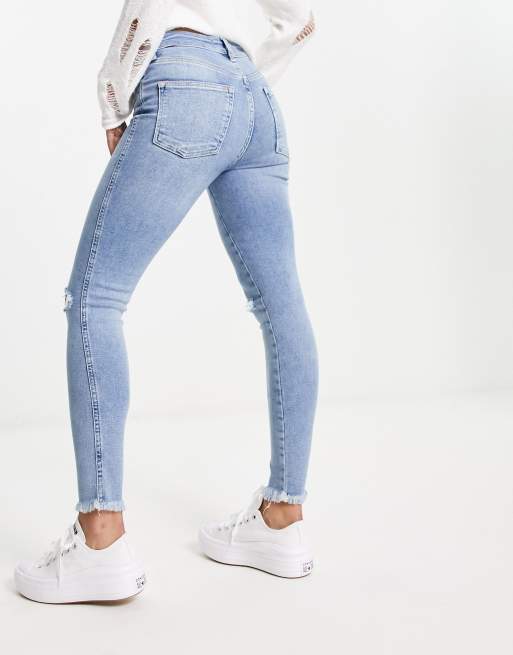 Free people best sale ripped skinny jeans