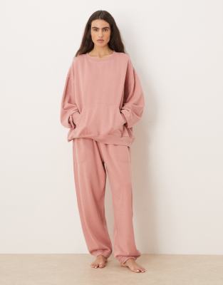 Free People - Slow It Down - Weite, kuschelige Jogginghose in gedecktem Rosa
