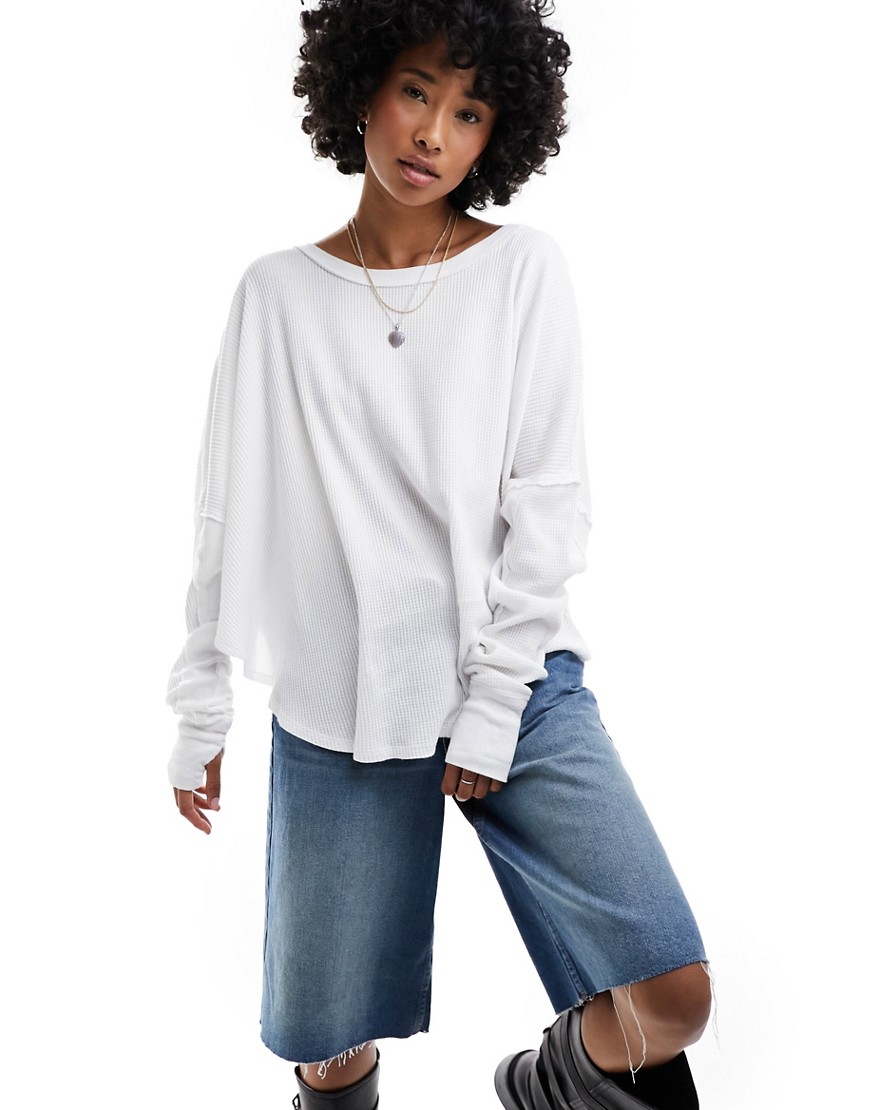 soft scoop neck long sleeve slouchy top in ivory-White