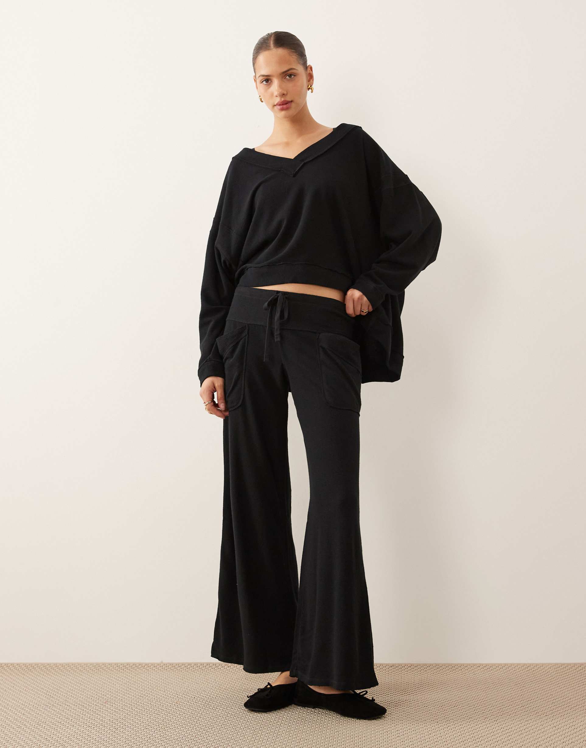 free people staycation wide leg lounge pants in black - part of a set