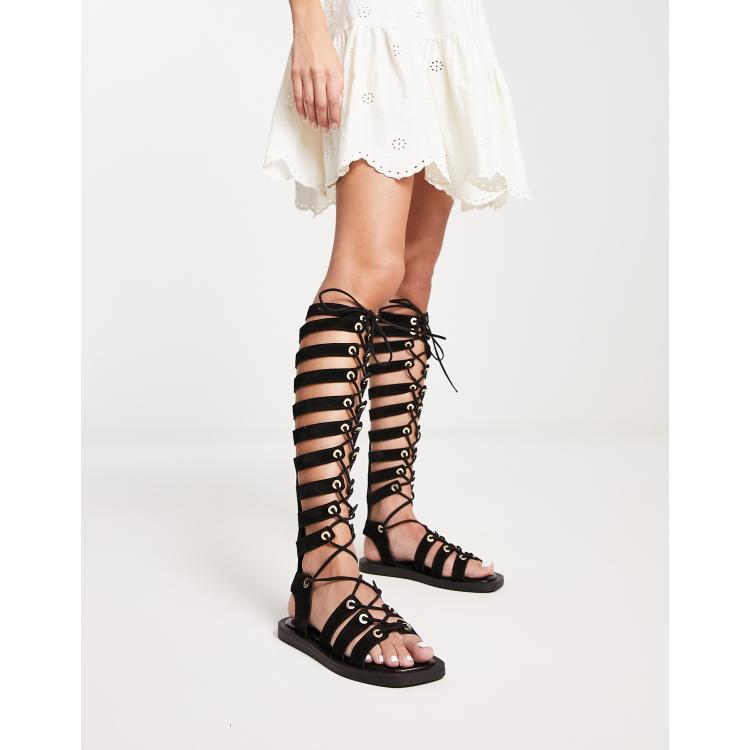 Over the best sale knee gladiator sandals