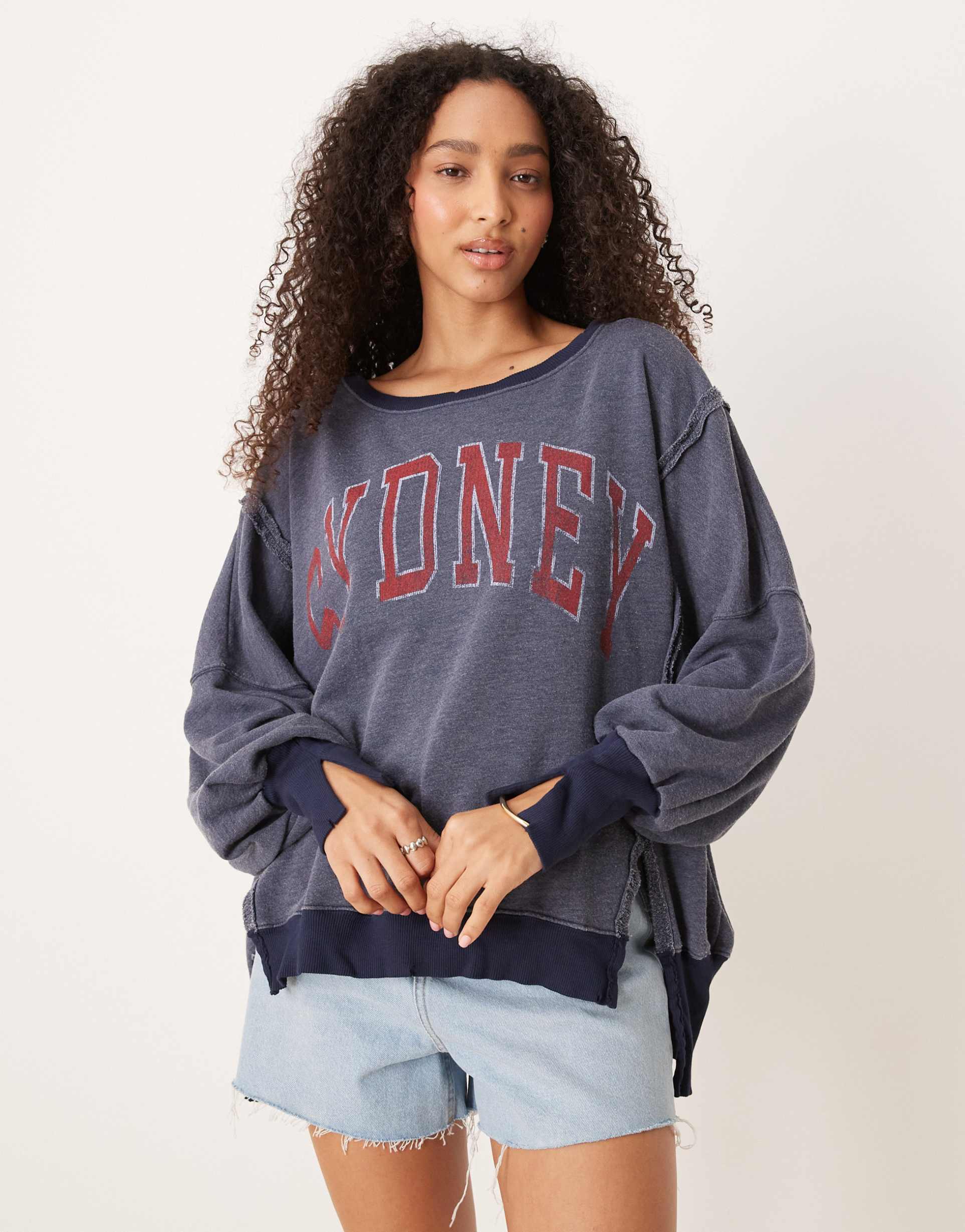 free people sydney graphic oversized sweater in washed navy