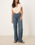 [Free People] Free People Tennessee low rise boyfriend jeans in mid-wash blue W25 OUTLAW
