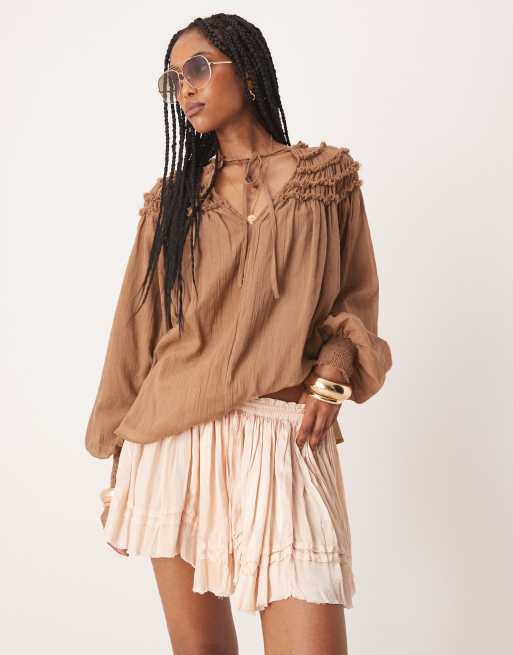 Free People third charm boho ruffle mini skirt in blush ASOS