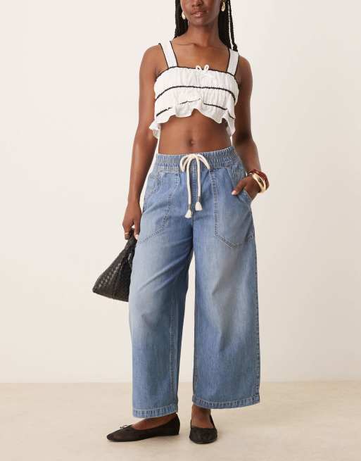 Free People tie-detail barrel leg pull-on jeans in mid wash blue