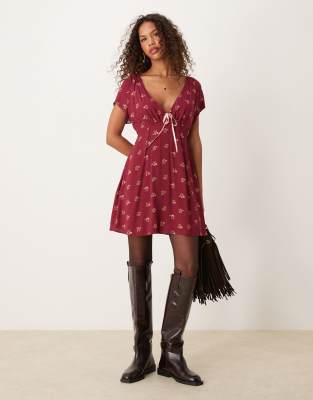 Free People tie-detail mini tea dress in raspberry | ASOS
