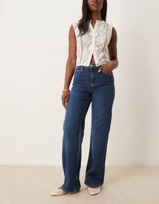 tinsley baggy high rise jeans in mid wash blue