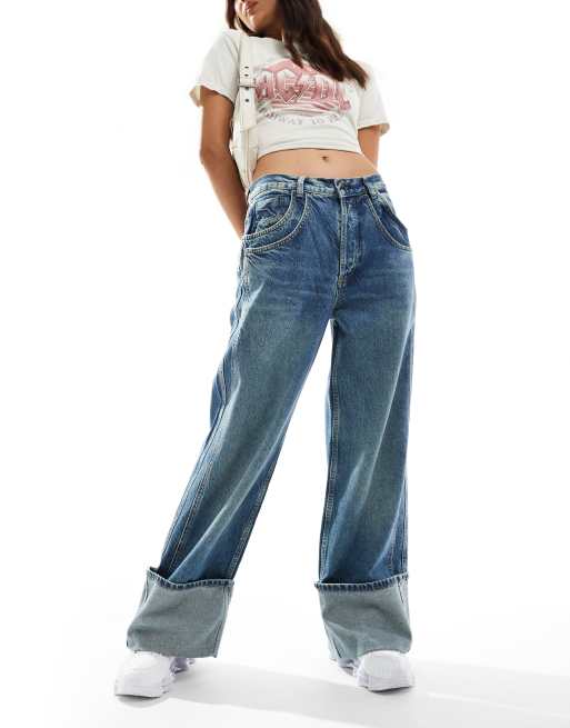 Free People turn up detail slouchy jeans in mid wash blue