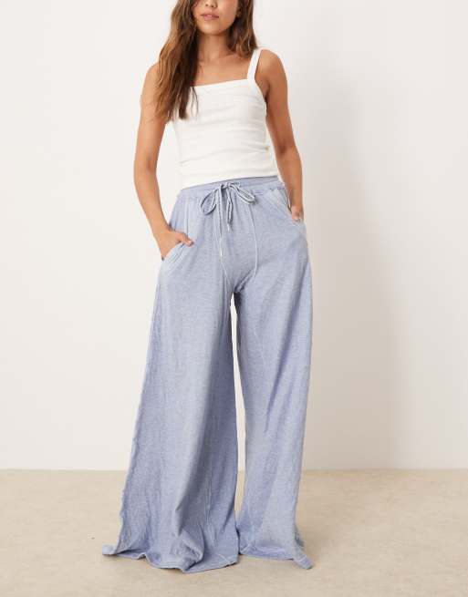 Free People wait a minute wide leg lounge trousers in navy heather, 2 of 5