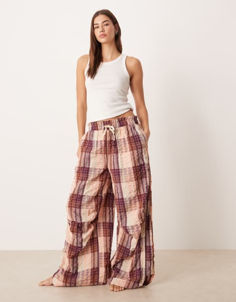 Free People wide leg check pyjama trousers in peach - view 1