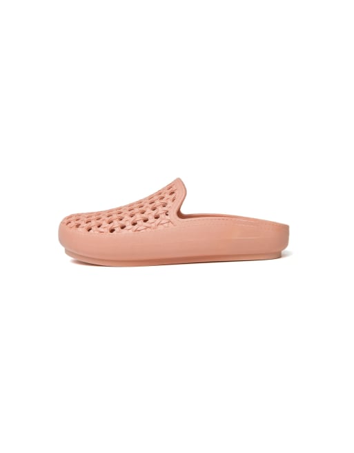 Freedom Moses Apricot shade clogs with rattan shape holes in apricot