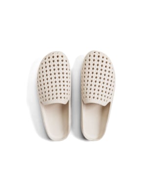 Freedom Moses Cream clogs with rattan shape holes in cream | ASOS