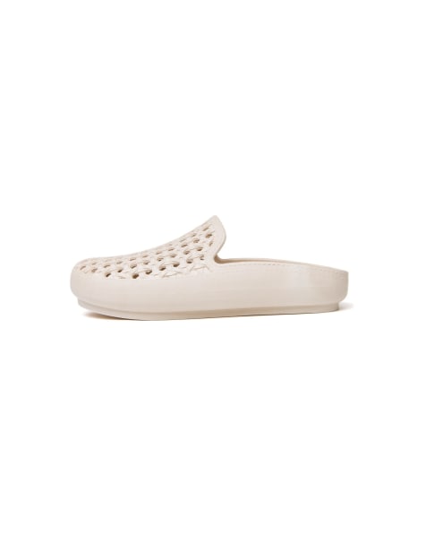 Freedom Moses Cream clogs with rattan shape holes in cream - view 1