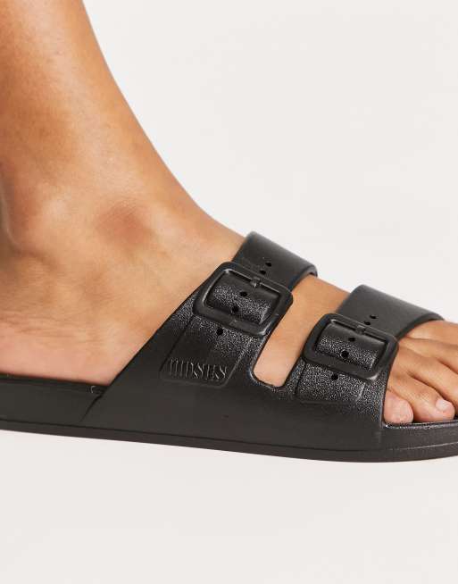 Freedom Moses scented sandals in black ASOS