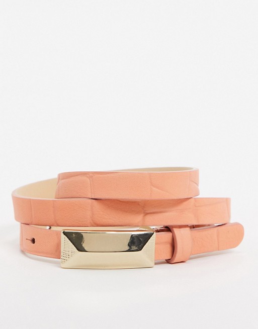French Connection belt with gold hardware in coral