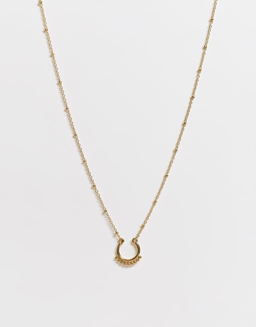 French Connection - Collana color oro con pendente a forma di ferro di cavallo