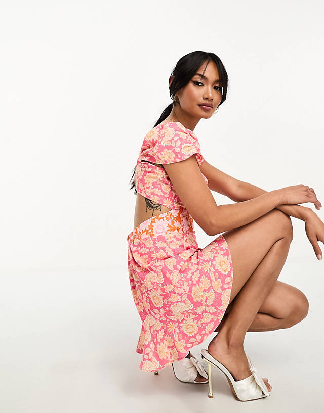 French Connection - flutter sleeve playsuit in pink floral