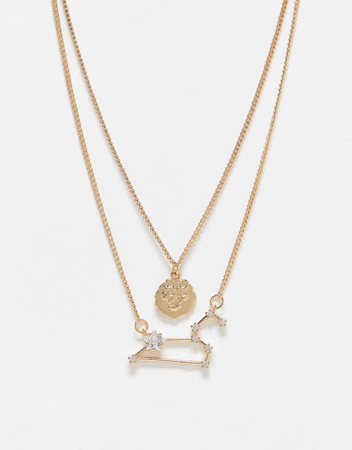 French Connection – Goldfarbene Halskette mit Sternzeichenanhänger (Löwe) und Strass