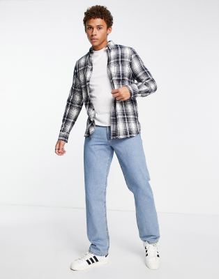 white tee and flannel